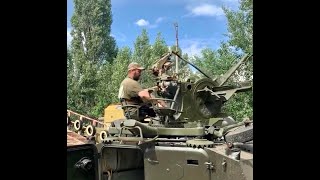 Ukrainian Forces attached an autocannon on captured Russian armor to defend against enemy forces