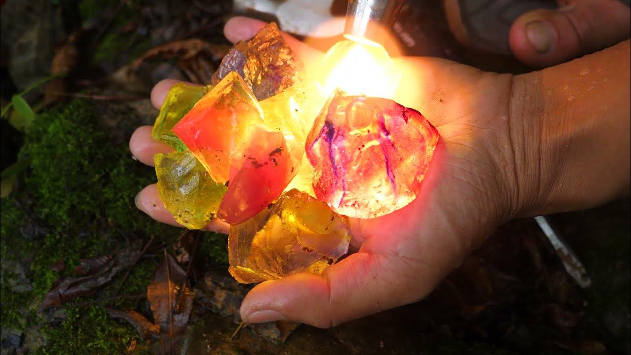 Fantasy crystals in the mysterious forest, the process of mining green crystals and red crystals