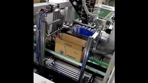 Automatic paper tissue bag robot hand inserting box machine cartoning machine