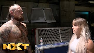 Cameras catch a tense moment between Black and LeRae at TakeOver: WarGames II: Nov. 21, 2018