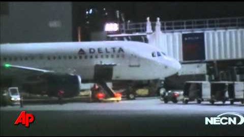 Plane Passenger Arrested; Tried to Open Exit