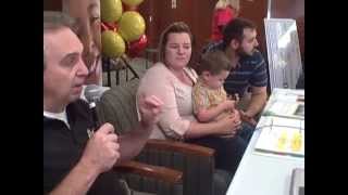Steve Granato talks with Samantha and Joel Fricker and Bryce at the ACHMV Radiothon