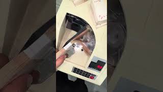 This machine has an error of counting one bill extra
