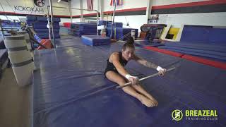 Drill 1: Floor Bar Toes to Bar builds strength and challenges flexibility