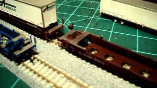 N scale 48' Husky into 48' Well with 5th Wheels 010.AVI