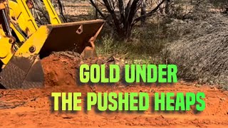 Gold nuggets under the heaps at the end of old pushing.