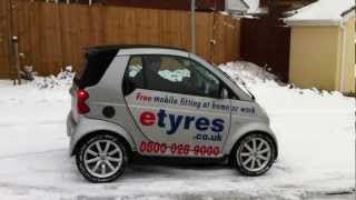 Smart Car in the snow with winter tyres