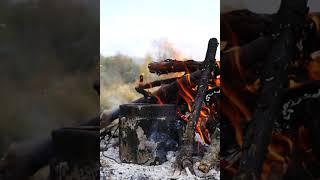 Gentle bonfire on the autumn river, beautiful nature. Nice video, for relaxation, for meditation