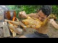 Primitive technology slingshot hunting duck and cook in traditional water tank