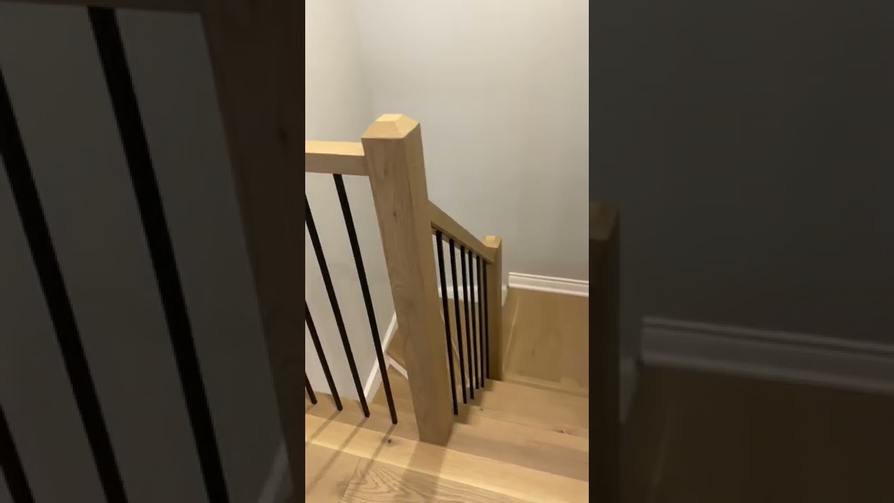 Stairs posts and railings made out of engineered hardwood flooring ...