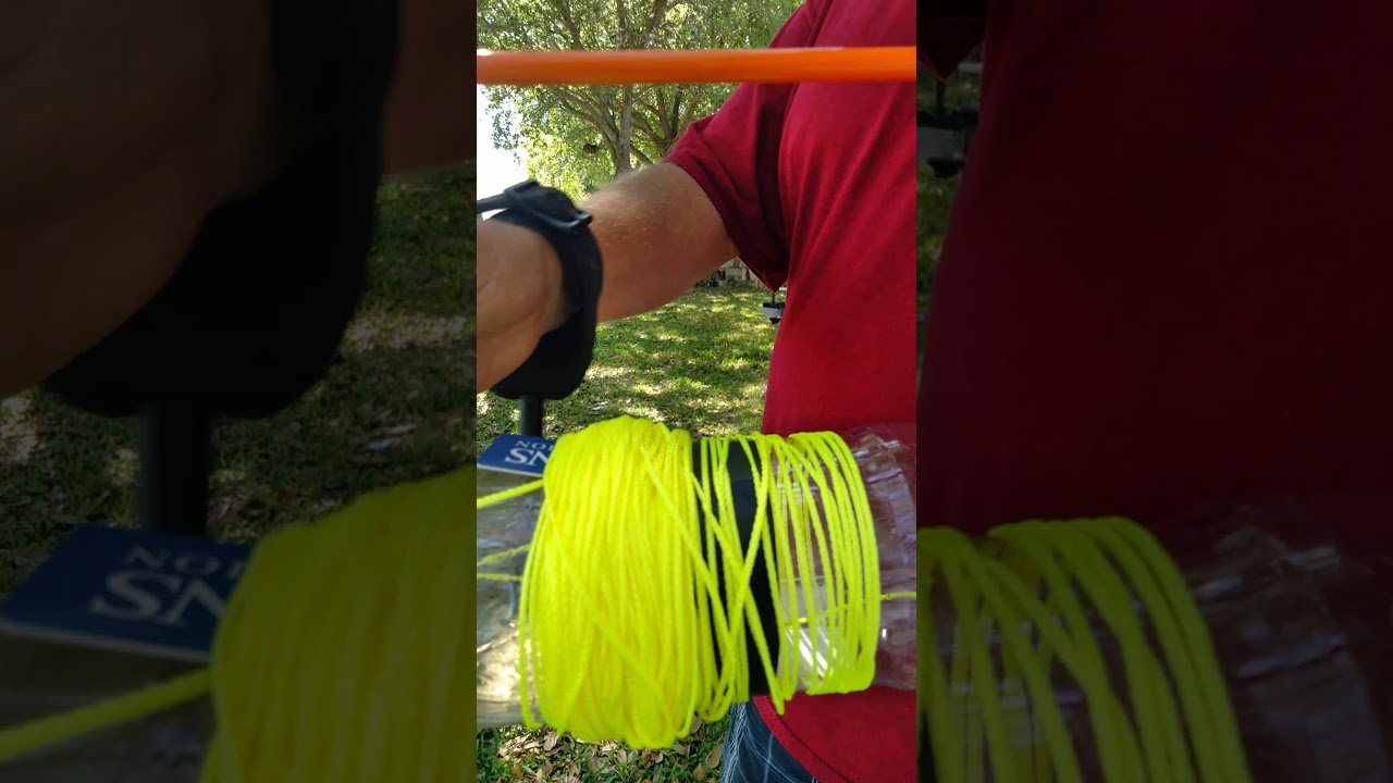 Make a Bowfishing Reel using a Coke bottle.