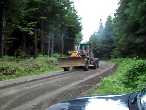 CAT 14G GRADER ON PORT MAIN