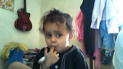 Adorable Nabhit playing with Laptop