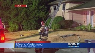 Crews battling SW Portland house fire