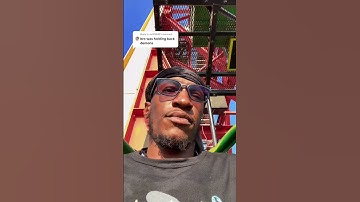 Guy rides on Lex Luthor Drop of Doom and has absolutely no reaction at all!