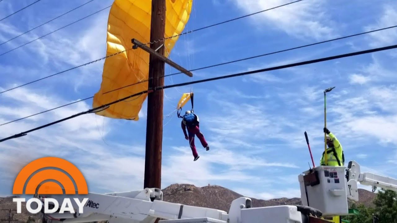 Skydiver Dangles From Power Lines After His Parachute Gets Snagged