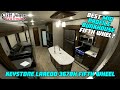 Keystone Laredo 367BH Bunkhouse Versus Arctic Wolf 3660 Mid Bunk Suite Fifth Wheel