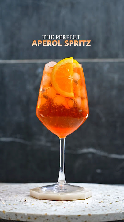 Aperol Spritz ๐๐น #AperolSpritz#SummerCocktails#SpritzSeason#EasyCocktailRecipe