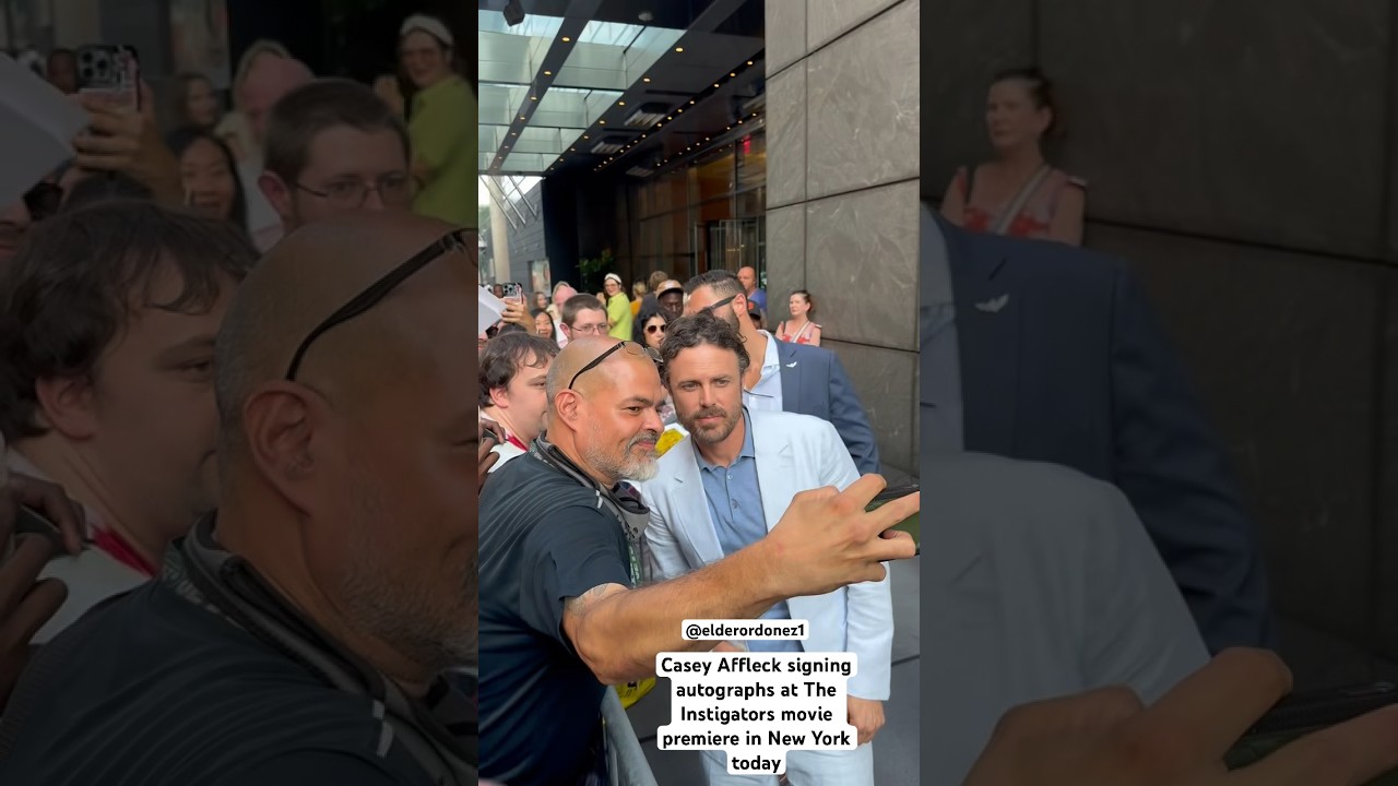 Casey Affleck takes  selfies with Fans outside The Instigators movie premiere in New York today 