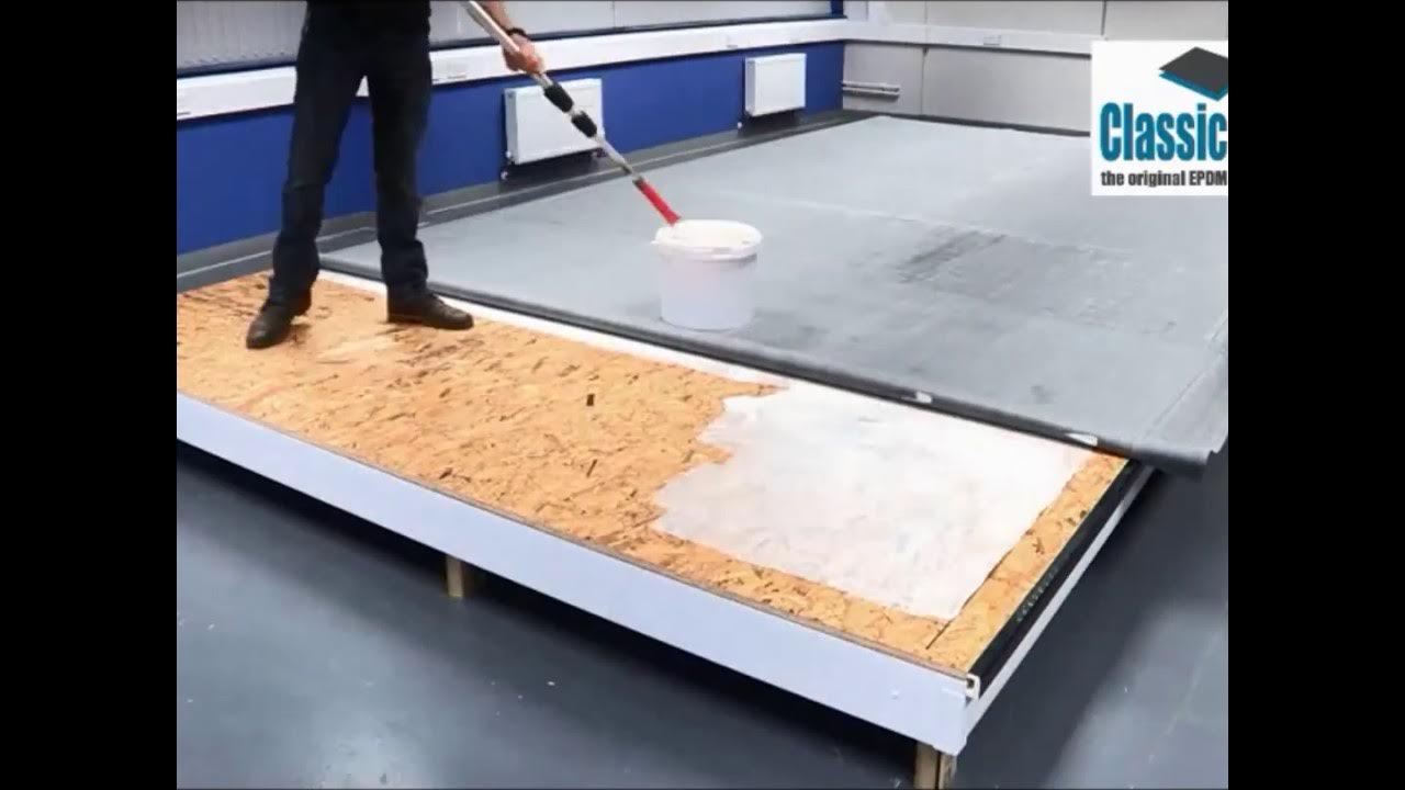 Modern flat roofing installation using EPDM rubber membrane system