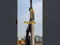 concrete piles driving by excavator