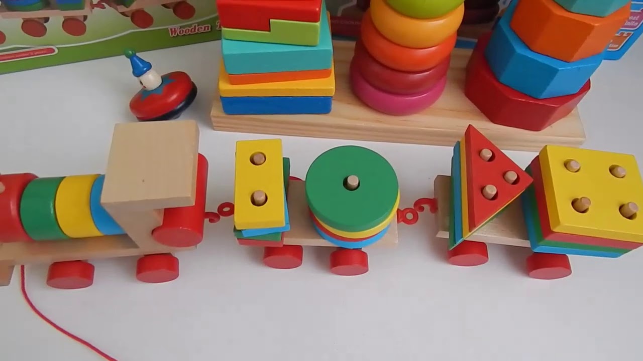 Наши любимые деревянные игрушки(пирамидка,поезд,рамка-вкладыш,сортер,волчек)Развивающие игрушки .