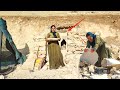 danger of winter is approaching; arduous work of a displaced mother to create a shelter