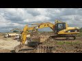 Excavatoer 4Units Doing Digging Land Put Dump Truck