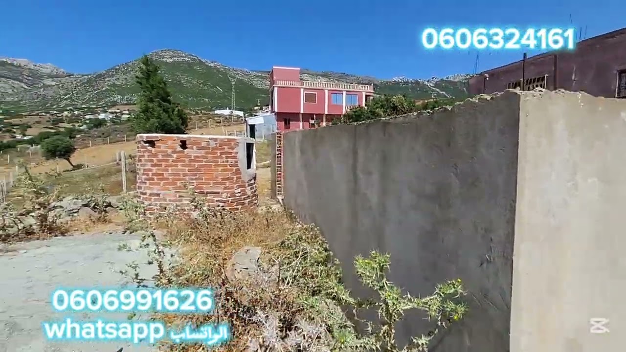 قطعة ارضيه محفظة 1500متر فيها دار 80متر وبير وصلا الماء والضوء والطريق في الخميس آنجرة