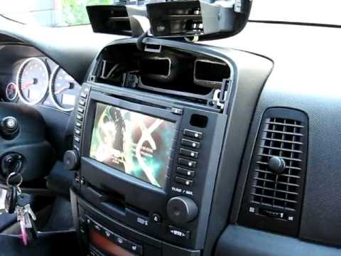 How to Remove Radio / CD Changer /  Navigation from 2004 Cadillac CTS for Repair