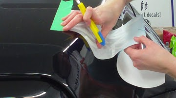 Installing a decal over a curved surface