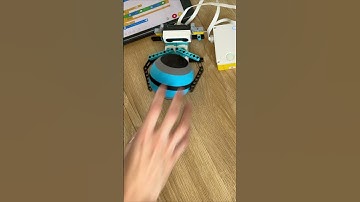 A Distance Sensor Helps a Robot Catch a Ball