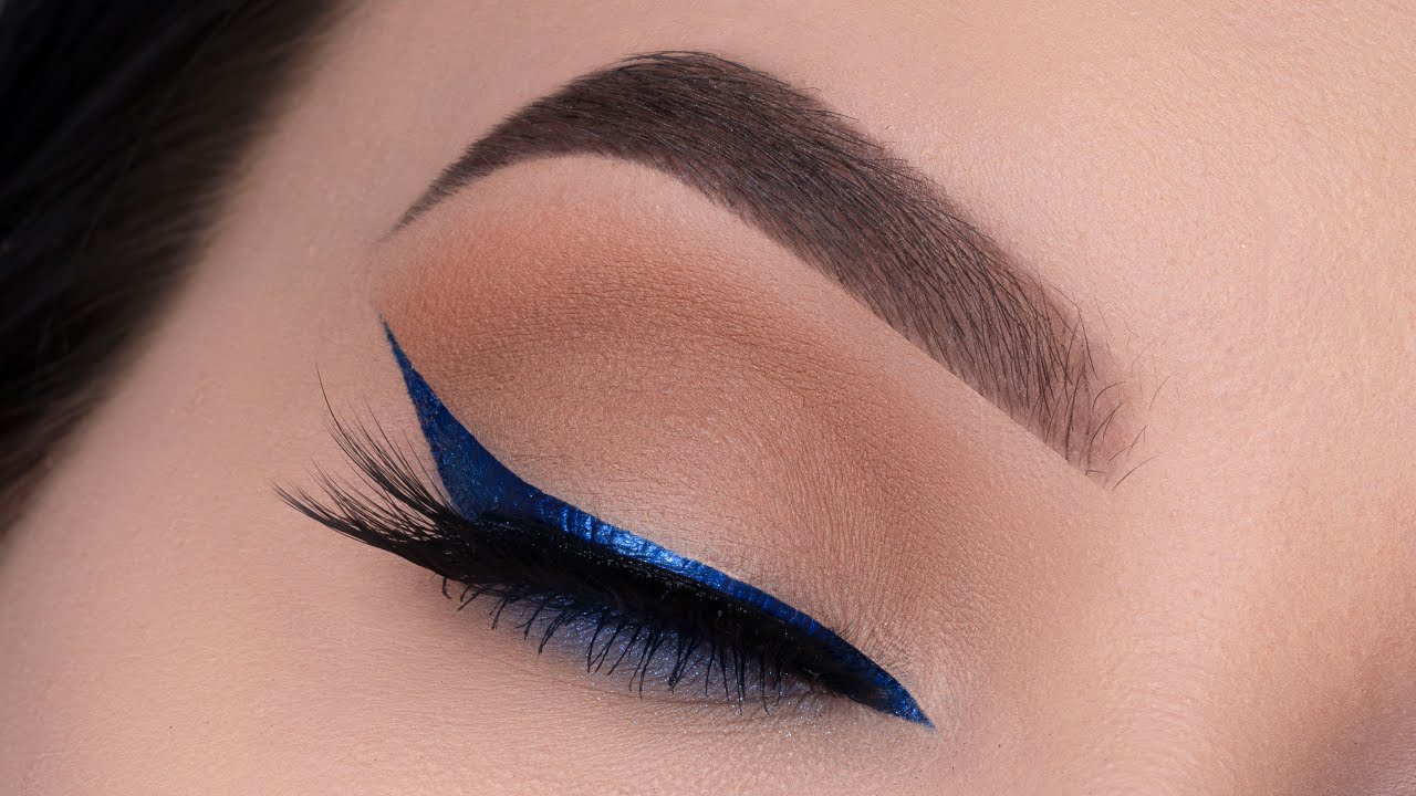 5. Blue Hair and Bold Winged Liner Makeup Look - wide 6