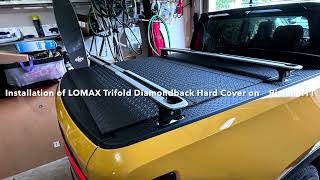 Installation of the Lomax Trifold Tonneau cover on the Rivian R1T
