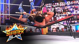 Dominik mysterio and seth rollins crash through a table at summerslam.
#summerslam wwe network | subscribe now: http://wwe.yt/wwenetwork
--------------------...