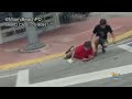 Caught On Camera: Miami Beach Man Attacked By Stranger As He Waited To Cross A Street