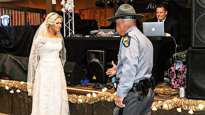 As This Bride Was Reciting Her Vows, She Told Six Police Officers To Stand Behind Groom