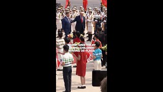 Famous Trump greeted by Xi and children waving US flags Wealth