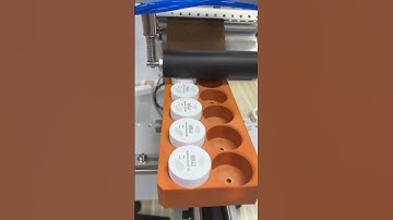 Semi automatic 6 bottle cosmetic small bottle cap top flat side labeling machine Music