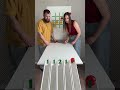 A fun showdown between couples! Who will be the king of tabletop pinball? #TabletopGames #FamilyEnte