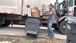Best way disposal trash truck in action on post Christmas trash!