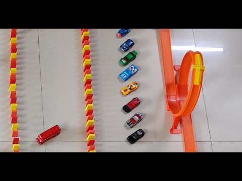 Hot Wheels car crashing into Dominoes!