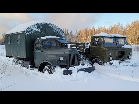 Видео: ЗИЛ-157 против ГАЗ-66 битва в глубоком снегу!