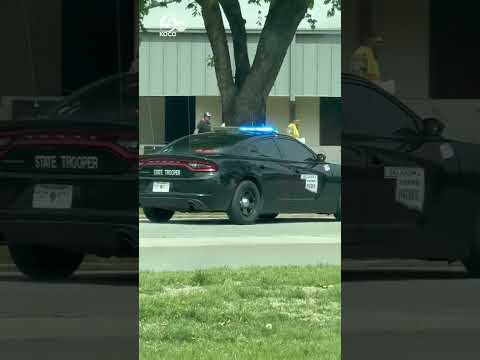 Video shows Pauls Valley High School principal wheeled out of school after he was shot