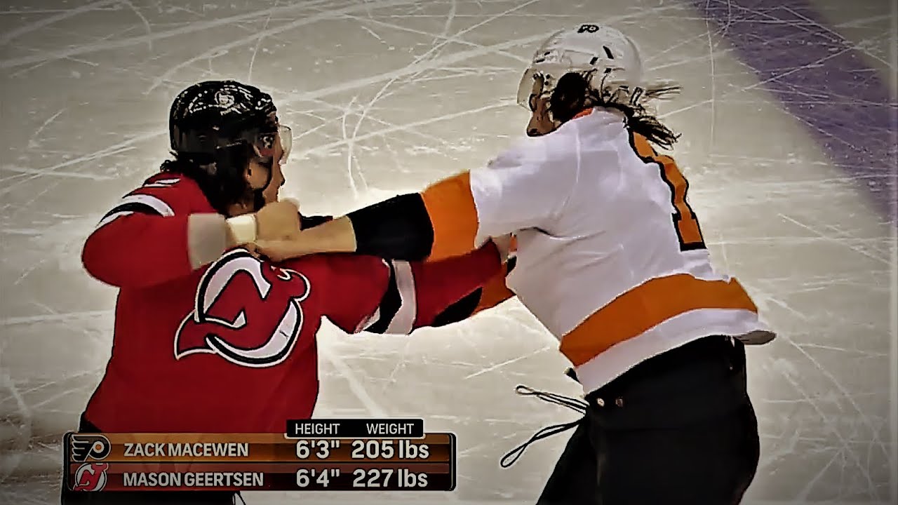 New Jersey Devils defenseman Mason Geertsen (55) and Philadelphia Flyers  center Zack MacEwen (17) fight during