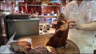 Hong kong food chopping roasted pigs bbq pork & chickens in wanchai