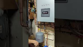 show and tell to customer why pressure relief valve dripping and it's because expansion tank broken.