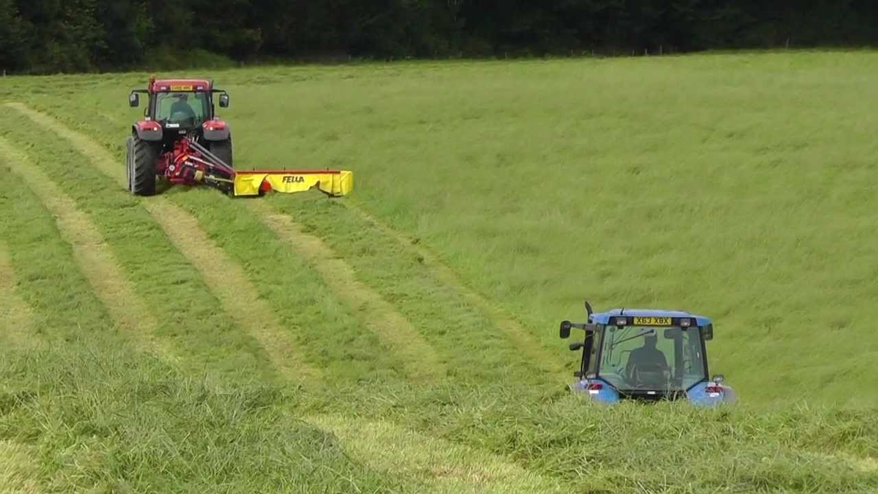 Silage 2011 - Mowing for Silage with NH and Mc.