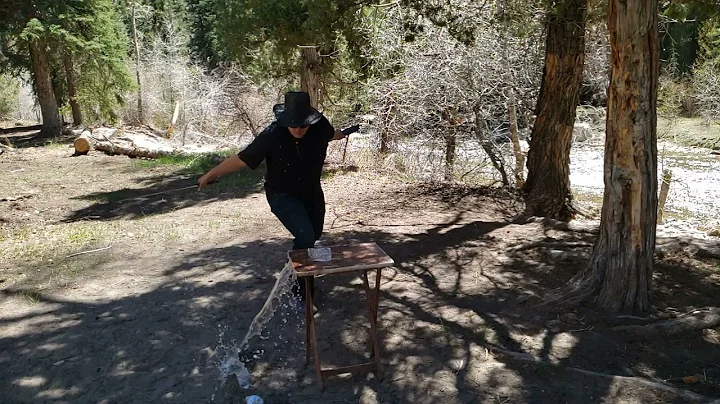 APOC Atrim Broad Sword Cutting Two Water Bottles in Slow Motion