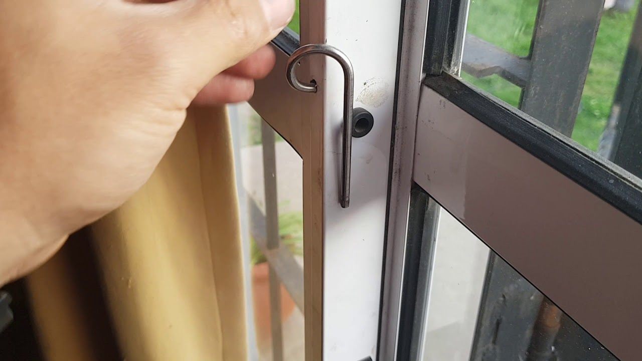 Traba para puerta corrediza